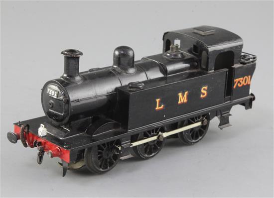 A scratch built Jinty class O gauge 0-6-0 LMS tank engine, black livery, number 7301, 3 rail, 22cm